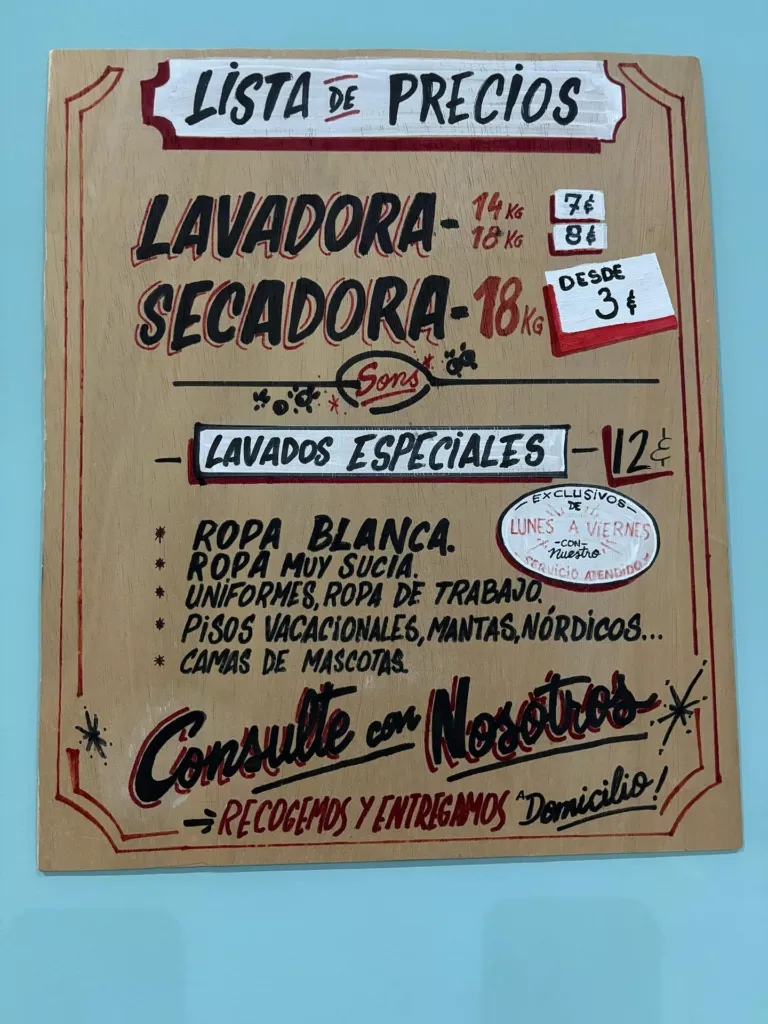 Cartel con servicios de lavandería